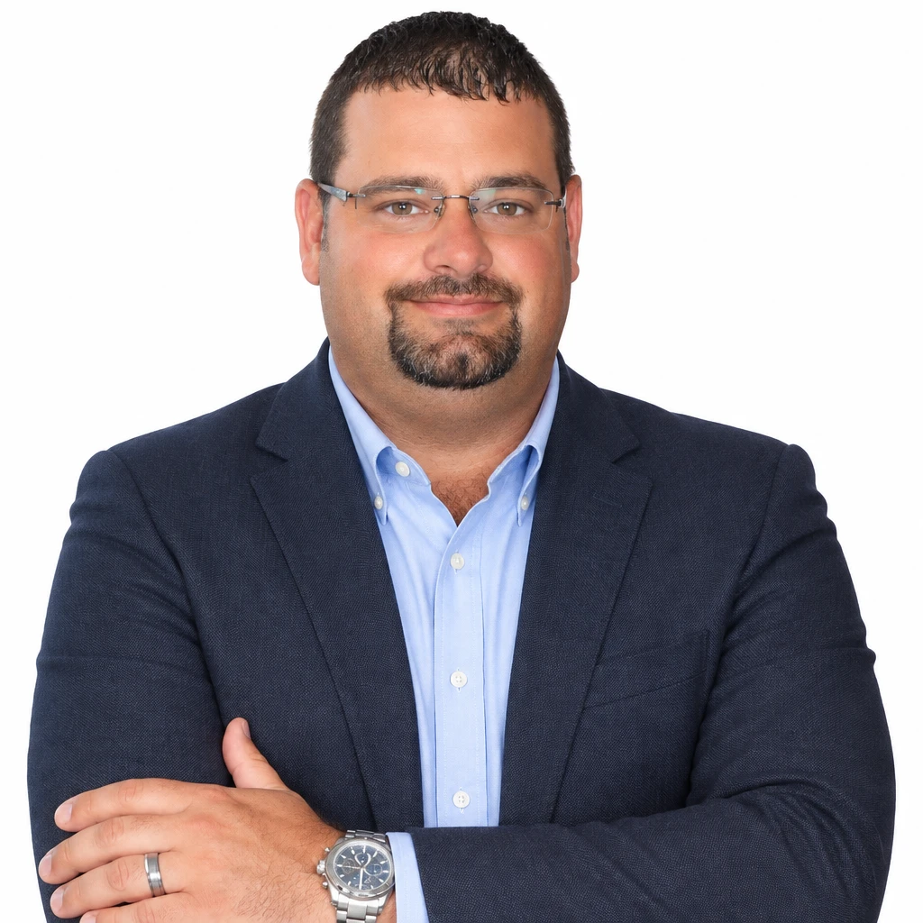 Michael Baldwin, founder of Work Safely Mobile Testing, in a navy blazer
